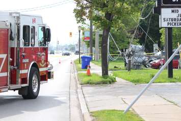 A pole fire causes a transformer to fall on Tecumseh Rd. at Southfield Dr. in Tecumseh, June 18, 2015. (Photo by Jason Viau)