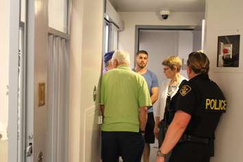 Members of the public are taken on a tour of the Chatham-Kent OPP detachment on May 19, 2016. (Photo by Ricardo Veneza)