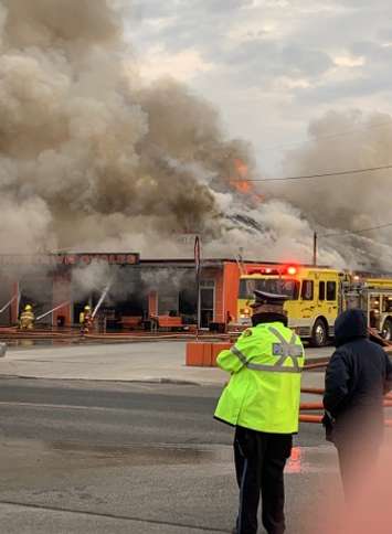 Fire tears through Hog Town Cycles in Lucan, April 7, 2019. (Photo by Angie Steels)