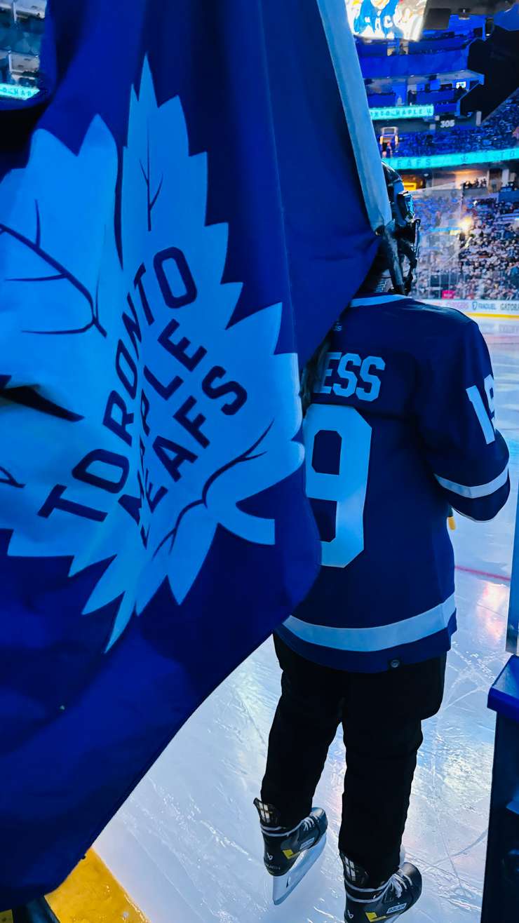 Aamjiwnaang's Madison Maness was the flag bearer at the Toronto Maple Leafs playoff game vs. Boston - Apr 24/24 (Photo courtesy of Stephanie Maness)