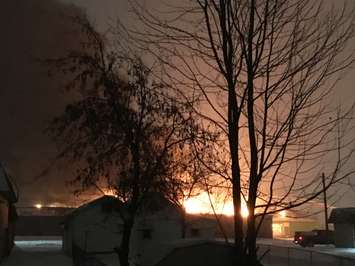 Fire crews battle a factory fire on Arnold St. in Wallaceburg, December 29, 2017. (Photo courtesy of Mike Lashmore)