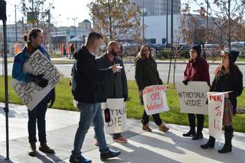 From left, Derrick Biso and Brandon Bailey demonstrate outside Windsor City Hall on November 23, 2018. Photo by Mark Brown/Blackburn News.