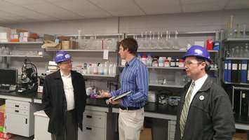 Green Party leader Mike Schreiner (left) and Green Party Sarnia-Lambton candidate Kevin Shaw (right) speak with Bio-Industrial research coordinator Stephen Reaume (middle). March 21, 2018. (Photo by Colin Gowdy, Blackburn News)