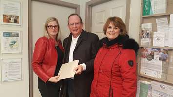 Mary Lou Crowley, Foundation of CKHA, receives $2,500 from Brian
Peifer and Deb Rhodes on behalf of the Royal Lepage Peifer Realty sales team. (Photo courtesy of the Foundation of the Chatham-Kent Health Alliance)