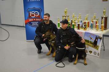 Windsor Police Constable Lance Montigny, left, with rookie K9 Officer Nik, and Constable Eric Willson with rookie K9 Officer Coal, at the Dillson Armoury, December 17, 2018. Photo by Mark Brown/Blackburn News.