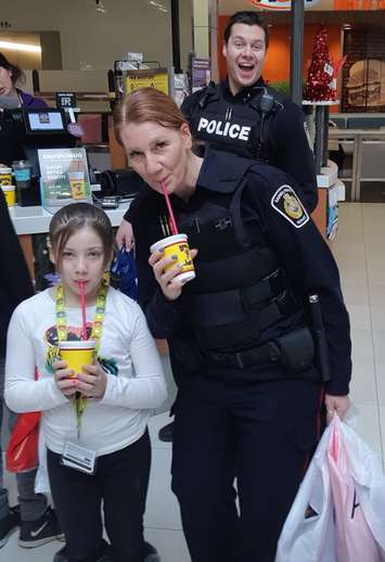 Enjoying Booster Juice during CopShop at the Lambton Mall. December 5, 2018. (Photo by the Sarnia Police Service)