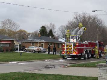 Fire officials investigate a vehicle explosion at a home on Wood St. in St. Thomas. (Photo by Miranda Chant, BlackburnNews.com)