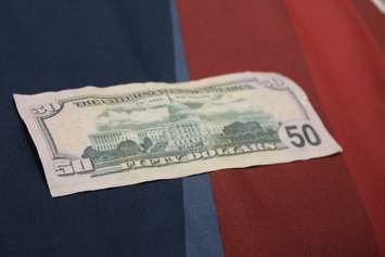 Counterfeit money found by the Windsor Police Service on display at media conference, December 1, 2015 (Photo by Maureen Revait) 