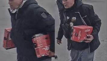 Surveillance camera of a suspect wanted in connection with a pair of retail thefts at a south Windsor business, October 28, 2025. Images provided by Windsor police.