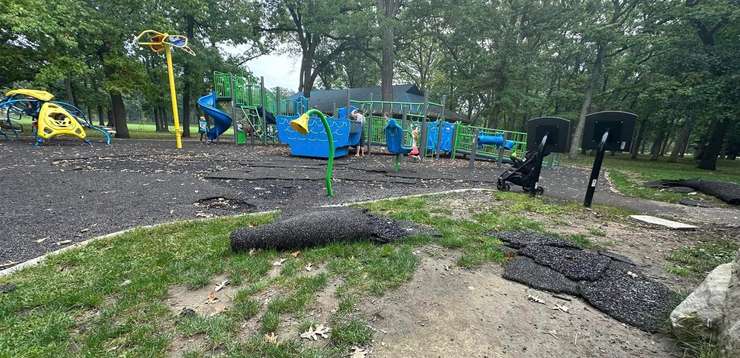 Ripped up black rubber matting at the Canatara Park playground in Sarnia. October 2023. (Photo courtesy of Robert Dïckïeson)