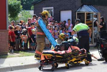 Emergency crews simulate an ATV crash at the Chatham-Kent Children's Safety Village, August 24, 2016 (Photo by Jake Kislinsky)