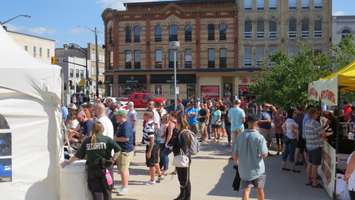Tragically Hip fans wait outside of Budweiser Gardens for the band's London concert, August 8, 2016. (Photo by Miranda Chant, Blackburn News)
