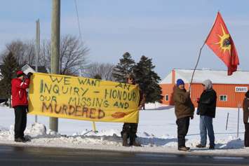 Walpole Island residents join the nationwide #ShutDownCanada movement at the intersection of Hwy. 40 and Dufferin Ave. on February 13, 2015. (Photo by Jason Viau)