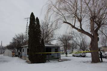 A fire at a mobile home on Marlin Crt. is under investigation.  February 17, 2015.  (Photo by Roy Kang.)