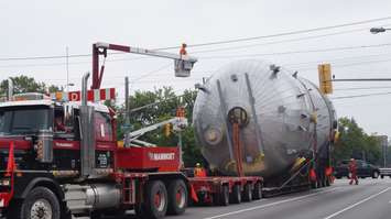 A large refinery vessel turns left on Exmouth from Murphy Rd. Has to make it through the width of the traffic lights. July 17, 2015 (BlackburnNews.com Photo by Briana Carnegie)