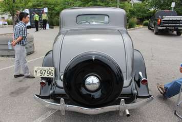Chrysler models old and new are shown off during the FCA Canadas 90th Anniversary celebration on Windsors riverfront, June 17, 2015. (Photo by Mike Vlasveld)