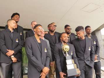 London Lightning players and Mayor Matt Brown with the NBL Canada Championship trophy on the steps of city hall, June 6, 2017. (Photo by Miranda Chant, Blackburn News)
