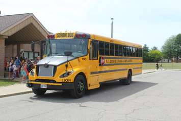 The electric schools bus arrives at St. Anne Catholic School in Belenheim for it's maiden voyage. June 15, 2018 (Photo by Greg Higgins)