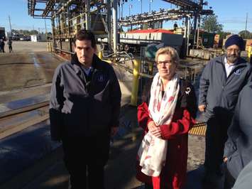 Kathleen Wynne with officials at Highbury Canco. October 16, 2015 (Photo by Kevin Black)