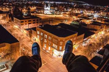 Picture of unknown individual seemingly trespassing on construction site in downtown Chatham.  (Photo submitted to BlackburnNews.com) 