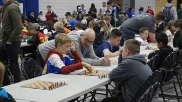 Students taking part in the St. Clair Catholic Chess Tournament at Holy Trinity in Sarnia. 18 April 2023. Photo by Sarnia News Today