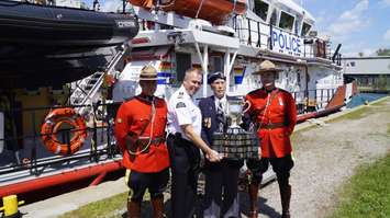 The Memorial Cup is loaded on the Canadian Coast Guard Ship Constable Carriere to travel to the Memorial Cup host city of Windsor.  May 18, 2017 (Photo by Melanie Irwin)