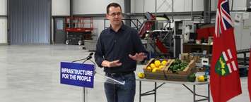 Minister of Infrastructure Monte McNaughton announces the provinces plans to expand natural gas access in rural Ontario at Cedarline Greenhouses in Dresden. March 10, 2019. (Photo by Greg Higgins)