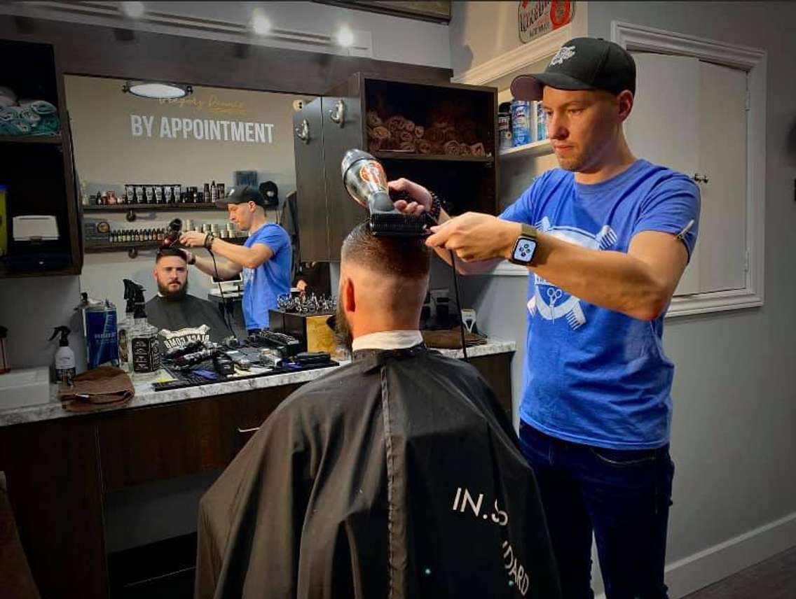 Black Comb Barbershop and Shave Parlour Master Barber Gregory Dennis. (Photo courtesy of Black Comb Barbershop Via Facebook)