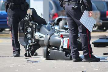 One person has been sent to hospital following a crash at the intersection of Lauzon Rd. and McHugh St., April 1, 2015. (Photo by Jason Viau)