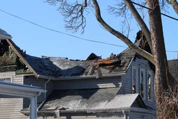 Firefighters at the scene of two house fires in the 800-block of Assumption St. in Windsor March 2, 2015. (Photo by Adelle Loiselle.)