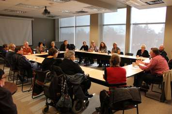 Ontario NDP leader Andrea Horwath holds a discussion in Windsor with those affected by CCAC cuts in service. (Photo by Jason Viau)