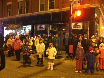 The Chatham Santa Claus  Parade progresses through downtown Chatham, November 14, 2014. (Contributed photo)