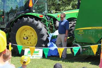 Volunteers demonstrate tractor safety at the Chatham-Kent Children's Safety Village, August 24, 2016 (Photo by Jake Kislinsky)