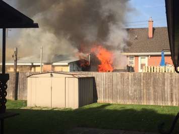 Firefighters respond to a garage fire on Indian Rd. in Sarnia, May 26, 2016. (Photo courtesy of Aaron Zimmer)