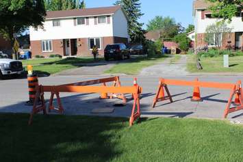 Chatham-Kent municipal crews work to repair a section of Wedgewood Dr. in Chatham. May 30, 2016. (Photo by Matt Weverink)