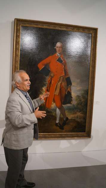 Chief Curator of Beaverbrook Art Gallery Terry Graff  explains the history behind the artwork. Photo by Jake Jeffrey. Sept. 30/2015 (blackburnnews.com)