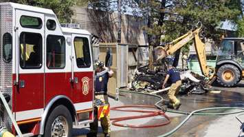 Sarnia Fire and Rescue puts out a sizeable dumpster fire off Exmouth St. July 19, 2017 (Photo by Melanie Irwin)
