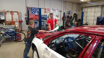 Students working on race car at JMSS (Photo by Simon Crouch) 