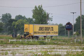 The trailer of the company demolishing the Windsor Raceway before a massive fire July 1, 2015.  (Photo by Adelle Loiselle)
