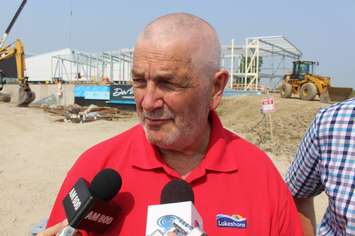 Lakeshore Mayor Tom Bain stands on the construction site, where his town's new aquatic centre is being built, July 6, 2015. (Photo by Mike Vlasveld)