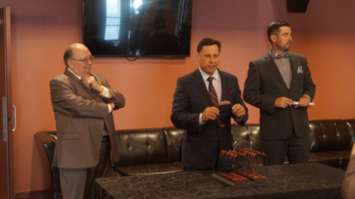 Economic Development and Infrastructure Minister Brad Duguid explores accessibility options offered at Imperial Theatre  May 29, 2015 (BlackburnNews.com Photo by Briana Carnegie).