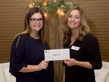 Candice Jeffrey, Foundation of CKHA, receives a $2,530 cheque from
Kristi Wilder, Chatham-Kent Association of Realtors at their annual Christmas Luncheon. (Photo courtesy of the Foundation of the Chatham-Kent Health Alliance)