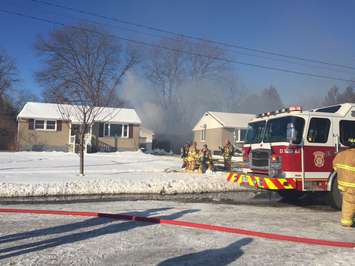 Sarnia Fire and Rescue crews work to extinguish a fire that fully engulfed a garage on Minto St. January 9, 2018 (Photo by Melanie Irwin)