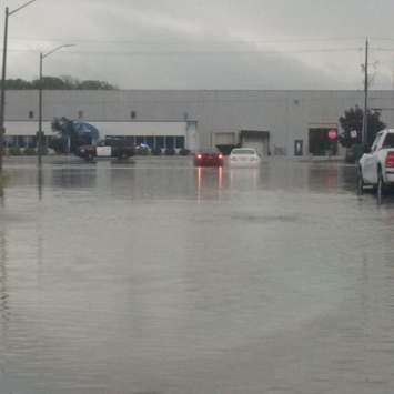 A record rainfall in Tecumseh causes flooding in the town on September 29, 2016. (Photo courtesy OPP)