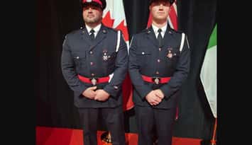 Sarnia Police Detective Constables Brown (L) and Ostenfeldt (R) at their Ontario Medal for Police Bravery ceremony (Photo courtesy of Sarnia Police Service)