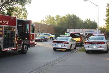 Fire vehicles outside an apartment building on Rivard Ave. in Windsor, October 7, 2015.  (Photo by Adelle Loiselle)