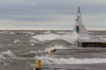 Waves wash over the Erieau Pier Oct. 28, 2015 (photo by Simon Crouch) 