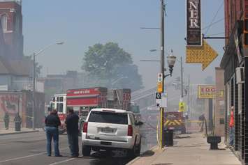 The view facing west on Wyandotte St. E in Windsor as firefighters work on a fire at Le Chef Restaurant, May 23, 2016.  (Photo by Adelle Loiselle)