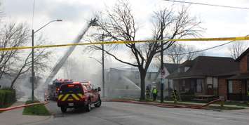Windsor Fire Service battles an abandoned house fire on Sandwich St. in west Windsor, April 11, 2017. (Photo by Maureen Revait) 