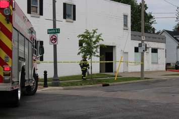 Firefighters at the scene of an apartment fire at the corner of Wyandotte St. E and Gladstone Ave. in Windsor, May 20, 2017.  (Photo by Adelle Loiselle)